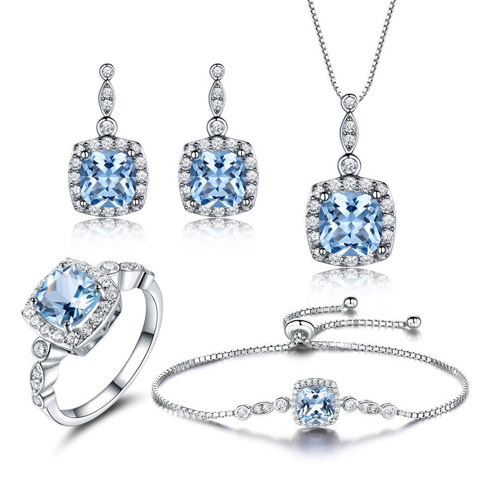 Sterling Silver Necklace Set with Sky Blue Topaz – Four-Piece Jewelry Set
