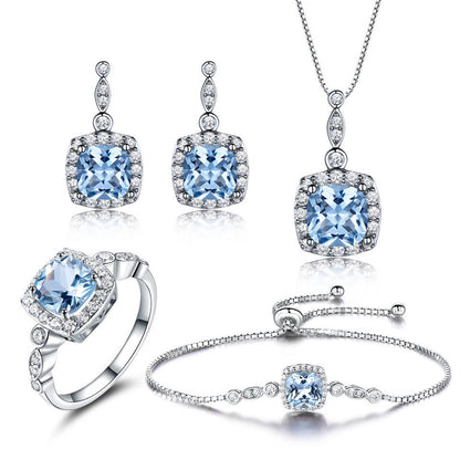 Sterling Silver Necklace Set with Sky Blue Topaz – Four-Piece Jewelry Set